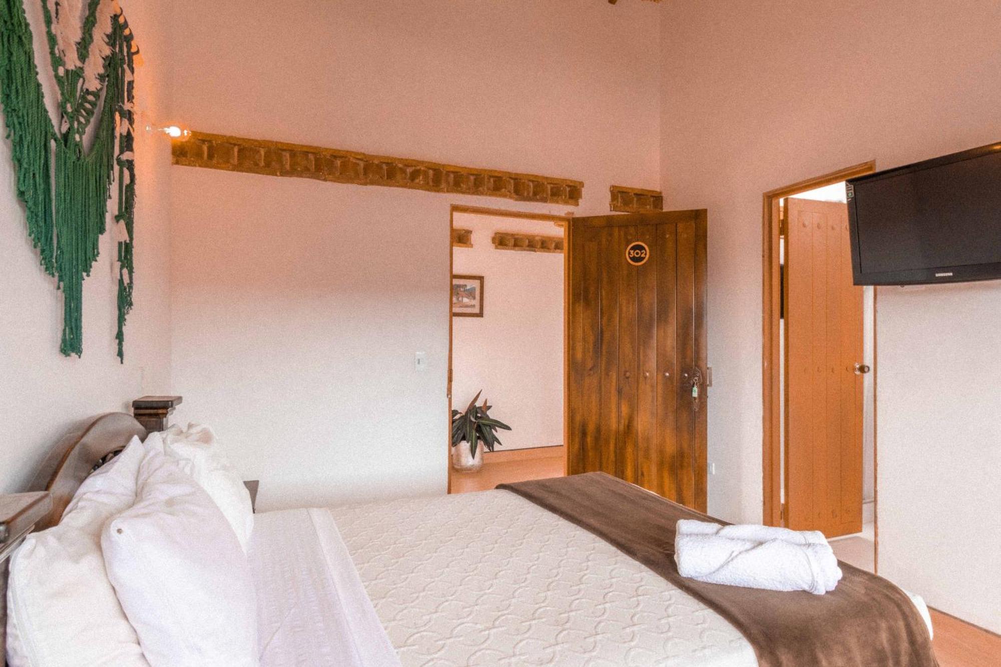 Artemisa Hotel Santa Sofía Quarto foto