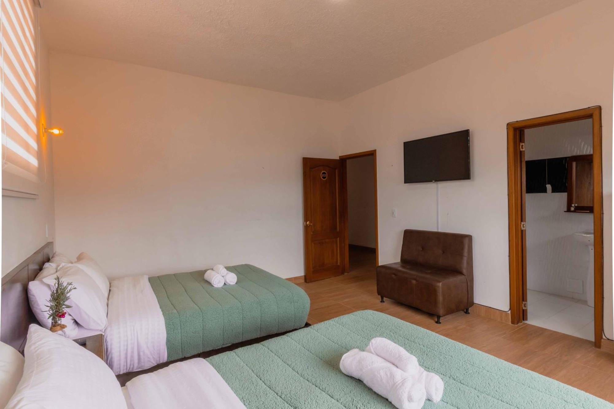 Artemisa Hotel Santa Sofía Quarto foto
